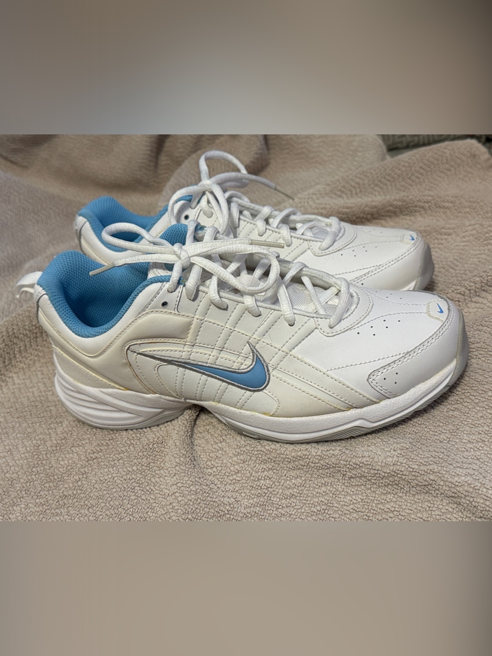 Nike Women's White Sneakers with Light Blue Accents